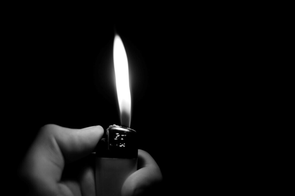 lighter, flame, fire, light, shining, mood, dark, black background, sad, grief, farewell, thoughtful, hot, warm, gas lighter, black-and-white